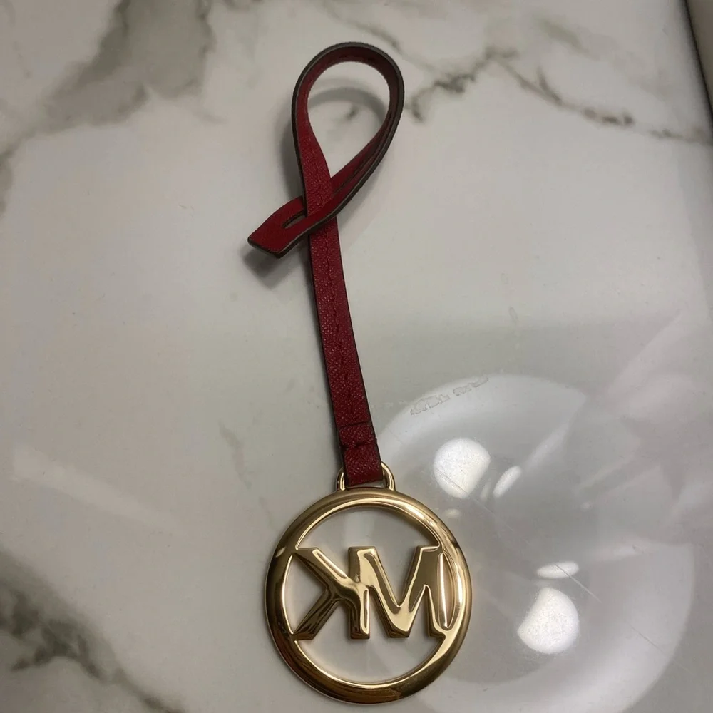 Michael Kors Gold Charm in Burgundy Leather